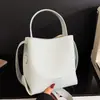 Ventas Directas de Fábrica de Nuevos y Modernos Bolsos Cubo de Mano para Mujer 2026, Elegantes Bolsos de Hombro Estilo Coreano, Versátiles Bolsos Cruzados