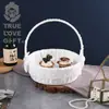 Suministros de boda cesta de boda juego para niños tres diseños cesta de flores pequeña juego de tres piezas grande, mediano y pequeño pétalos de boda cesta de flores fabricantes