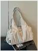 Bolso de mano informal de gran capacidad con múltiples compartimentos y pliegues simples, modelo nuevo 2026, color liso, versátil, con textura, bandolera, moderno