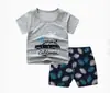 Novo conjunto de shorts de manga curta para crianças verão meninos e meninas camiseta roupas infantis conjunto de duas peças de manga curta para bebê Atacado