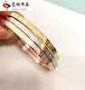 Conjunto de pulseiras europeu e americano mais vendido três cores opcionais largura 4,5 MM aço inoxidável padrão Grande Muralha fecho pulseira BY-066