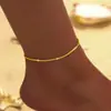 Europa y Estados Unidos transfronterizo súper popular estilo oruga eólica ultra simple tobillera lujo ligero moda estrellas caen en las estrellas del río cadena de tobillo para mujer