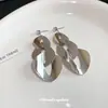 Pendientes Metálicos Geométricos de Aguja Plateada con Borlas, Estilo Europeo y Americano, Modernos y Lujosos, Pendientes Exagerados de Alta Gama