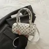 Bolsa única de bolinhas para mulheres 2025 nova bolsa de ombro transversal retrô francesa bolsa de mão requintada para mulheres bolsa cilíndrica