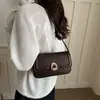 Bolsa texturizada para axila feminina, nova bolsa versátil de ombro e transversal 2026, bolsa baguette nicho para o dia a dia para senhoras