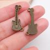Antiguas notas musicales verdes instrumentos musicales DIY aleación accesorios de joyería collar pulsera pendientes colgante colgante colgante venta caliente transfronteriza
