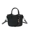 Bolsa Tecida de Nicho da Moda Popular Estilo Coreano Feminina 2026 Novo Estilo Bolsa Transversal da Moda Bolsa de Balde Texturizada para Mão