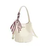 Otoño 2026 Nuevo Bolso de Mano Retro de Nicho para Mujer Bolso de Hombro Simple de Moda Bolso Cubo Tejido