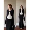 Um look sofisticado e estiloso para a estação outonal: uma saia midi de bolinhas, um vestido longo justo e um conjunto estilo coreano