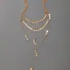 Europa y Estados Unidos collar de personalidad transfronterizo nuevo borla estrella Luna disco multicapa moda OL cadena larga para suéter mujer