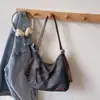 Colección de otoño 2026 transfronteriza: bolso de hombro elegante y de alta calidad, bolso tote retro, moderno y visualmente atractivo, gran capacidad, mochila casual
