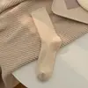 Meias de lã femininas, espessadas e forradas com fleece para aquecimento, cor sólida, simples e versáteis, meias de cano longo estilo japonês para outono e inverno