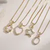 Collar Versátil Colgante Geométrico Corazón de Concha Cruz de Cobre Chapado en Oro de 18 Quilates Circonita Aogu Transfronterizo Nicho Exquisito