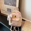 Mochila de estilo lujo ligero con estampado de oso para mujer, mini mochila versátil coreana con un toque juvenil, adecuada para estudiantes y para ir al trabajo.