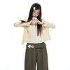 Conjunto de Dos Piezas Naranja Infantil Estilo Coreano Cardigan con Tirantes para Mujer, Corte Holgado, Adelgazante, Cintura de Encaje, Pantalones Casuales de Pierna Ancha Versátiles y de Moda.