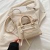 Bolsa de Mão Feminina Moda 2025 Primavera Nova Coreana Cor Sólida Retrô Trançada Pequena Quadrada Bolsa de Ombro Transversal Feminina