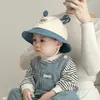 Gorro de bebé primavera y otoño coreano súper lindo cuerno de ciervo niño gorra tipo cubo primavera delgado protector solar para bebé niño gorra de pescador