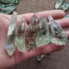Mineral en bruto cristal natural mineral en bruto espécimen de cristal verde piedra en bruto de cristal verde venta al por mayor cristal columna vertebral cristal único desmagnetización