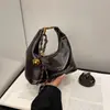 Bolsa de Mão de Luxo Feminina 2025 Primavera Popular Retro Versátil Super Popular Bolsa de Ombro para o Dia a Dia Bolsa Transversal