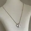 Collar de corazón de perla y circón de lujo ligero estilo francés para mujer, vintage, delicado, moderno, a la moda, versátil para el trabajo, cadena para la clavícula