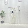 Expositor de tienda de ropa Percha de acero inoxidable montada en la pared Estante colgante lateral para tienda de ropa infantil
