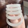 Venta al por mayor de fábrica jade dorado natural jade blanco sebo de Hotan pulsera redonda pulsera plana para niña pulsera de jade Tianshan Cui