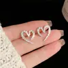 Pendientes de Corazón de Nicho 2026 Nuevo Estilo Caliente Pendientes de Botón Hermosos de Alta Gama Moda de Lujo Ligero Accesorios de Pendientes Absolutamente Impresionantes