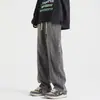 Jeans de calle americanos desgastados con cordón para hombre, nueva marca de moda 2026, corte holgado, pantalones largos rectos versátiles, ropa para hombre