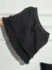 La popular falda midi de punto acanalado de color blanco roto de cintura alta en línea A con cordón para mujer de este año, estilo dulce y picante de otoño, falda corta tipo pastel adelgazante