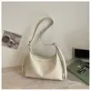 Bolsa de Ombro Feminina Retro Transfronteiriça para o Dia a Dia 2026 Novo Estilo Moda Casual Bolsa de Ombro Único Nicho Grande Capacidade Bolsa Tote Feminina
