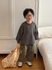 Roupa Infantil Montaigne 2025 Camiseta Listrada de Manga Comprida de Primavera e Outono para Bebês Meninos e Meninas Camiseta Simples Solta Batmóvel