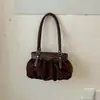 Bolso Femenino para Axila 2026 Nuevo de Moda Verano Gama Alta Nicho para Viajes Diarios Bolso de Hombro Único Bolso Cubo Plegado Cruzado