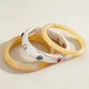 Pulsera Redonda de Resina Incrustada con Diamantes Transfronteriza Europea y Americana, Sensación de Lujo Ligero y Gama Alta, Sencilla, Moderna y Versátil, Elegante Joyería de Mano para Mujeres