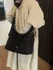 Bolso bandolera versátil para mujer 2026 nuevo estilo moderno bolsa de tacto de alta gama bolso casual para el trabajo de un solo hombro bandolera bolso para el trabajo