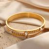 Francés Nuevo estilo retro lujo ligero estilo compuesto acero de titanio chapado en oro de 18 quilates hueco diamante turquesa pulsera joyería al por mayor