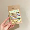 Horquillas Lote de Un Yuan Artículos de Puesto Callejero Accesorios para el Cabello Juego Completo Empaque Dibujos Animados Accesorios de Doble Cara Pinzas Pequeñas Accesorios para el Cabello de Niños Venta al por Mayor