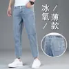 Super Nuevo Otoño Jeans de 9 Puntos para Hombre Rectos Sueltos Elásticos Guangzhou Xintang Transpirables Pantalones de Nueve Puntos para Personas Bajas