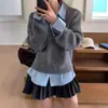 Estilo de Diseño Coreano Otoño e Invierno 2026 Nueva Camisa Sencilla con Cuello Polo y Suéter de Punto Moda Top Falso de Dos Piezas