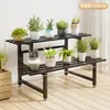 Soporte de flores de pie para balcón y sala de estar, estante de arte de hierro moderno simple para plantas suculentas, estante de escalera multicapa de acero inoxidable
