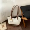 Bolsa Transfronteriza de Gran Capacidad para Mujer Verano 2026 Nuevo Versátil Moda Hombro Tendencia Viajero Retro Casual Bolso Tote