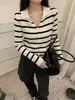 Chaqueta cárdigan de punto con cuello polo blanco para mujer, nuevo estilo otoño e invierno 2026, top interior adelgazante