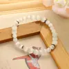 Pulsera de Ojo de Gato Rosa Estilo Lujo Ligero Moda para Niñas Elegante Versátil Círculo Único Pulsera de Perlas Redondas Joyería al por Mayor en Europa y América