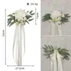 Decoração de cadeira com encosto para evento ao ar livre estilo ocidental Decoração de cadeira com flor flor amarrada flor artificial flor artificial festa de casamento plástico flor de seda