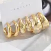 Explosiones Europeas y Americanas 3/6 Par de pendientes de traje Gotas Doradas Forma de C Irregulares para Mujer Retro Simples de Frijol Transfronterizo