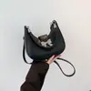 Diseño Texturizado y Elegante de Lazo 2025 Nuevo Bolso Cruzado de Hombro para Axila de Color Sólido Simple para Mujer