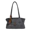 2026 Bolso de Hombro Bajo Diseño de Correa de Cuero Retro para Mujer Otoño Gran Capacidad Simple Sensación de Alta Gama Bolso Tote de Hombro Único Bolso de Hombro Bajo