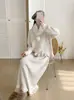 2026 Primavera Temprana Nuevo Estilo Cárdigan Suéter con Flores Tridimensionales con Bufanda + Falda de Punto Conjunto Estilo Dulce para Mujer Moderno
