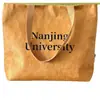 Bolsas de papel DuPont al por mayor, bolsas de tela tipo tote en blanco con logo impreso, bolsas de almacenamiento de gran capacidad, bolsas de papel kraft lavables