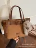 Bolso pequeño súper popular para mujer, nuevo modelo de verano 2026, bolso cruzado tipo cubo de nicho de alta gama para el día a día