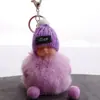 Llavero de muñeca linda durmiendo, lindo colgante de bola de pelo de bebé de dibujos animados, llavero de coche, adornos para bolsa, venta al por mayor